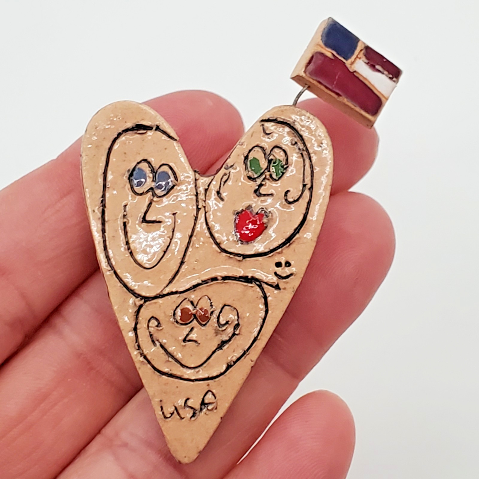 VTG Heart Brooch 2.25in Tan Porcelain Hand Crafted Floating Flag Faces USA Pin