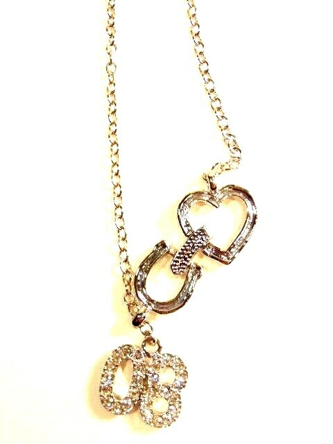 pre-owned silver colored necklace with white crystals “Class of 08”