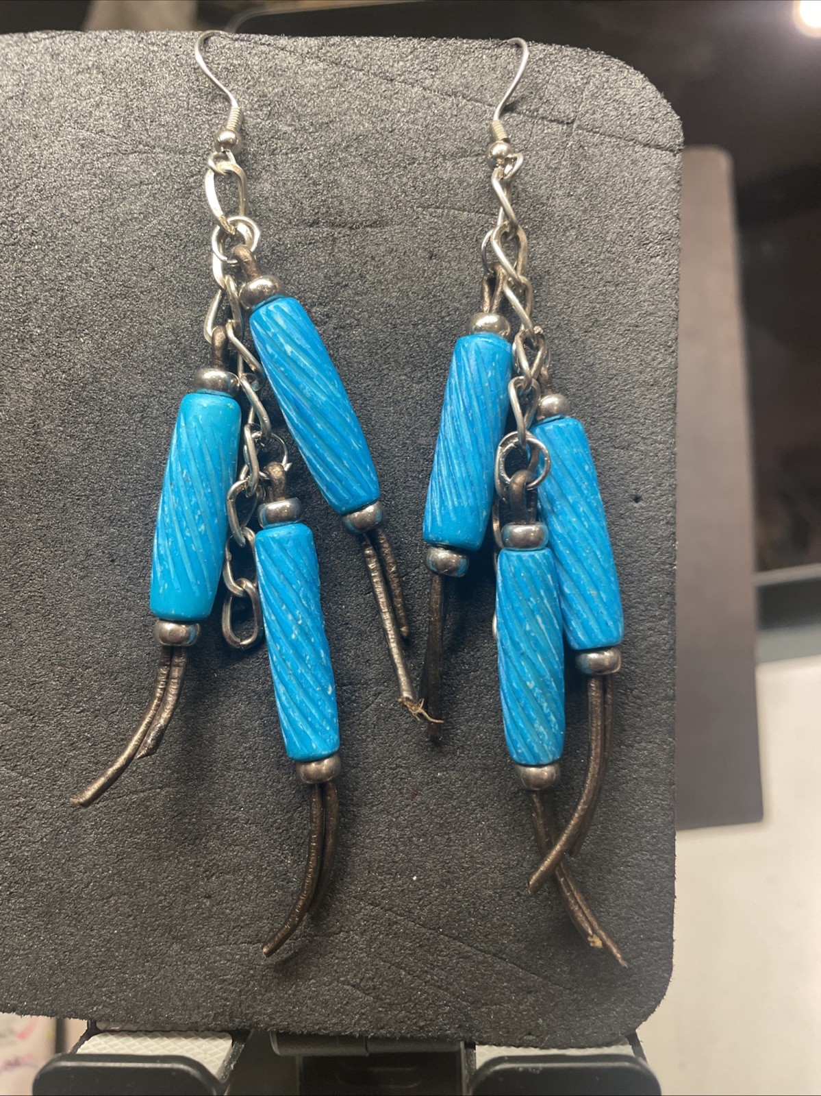 Etched Bone Beads Dangle On Leather