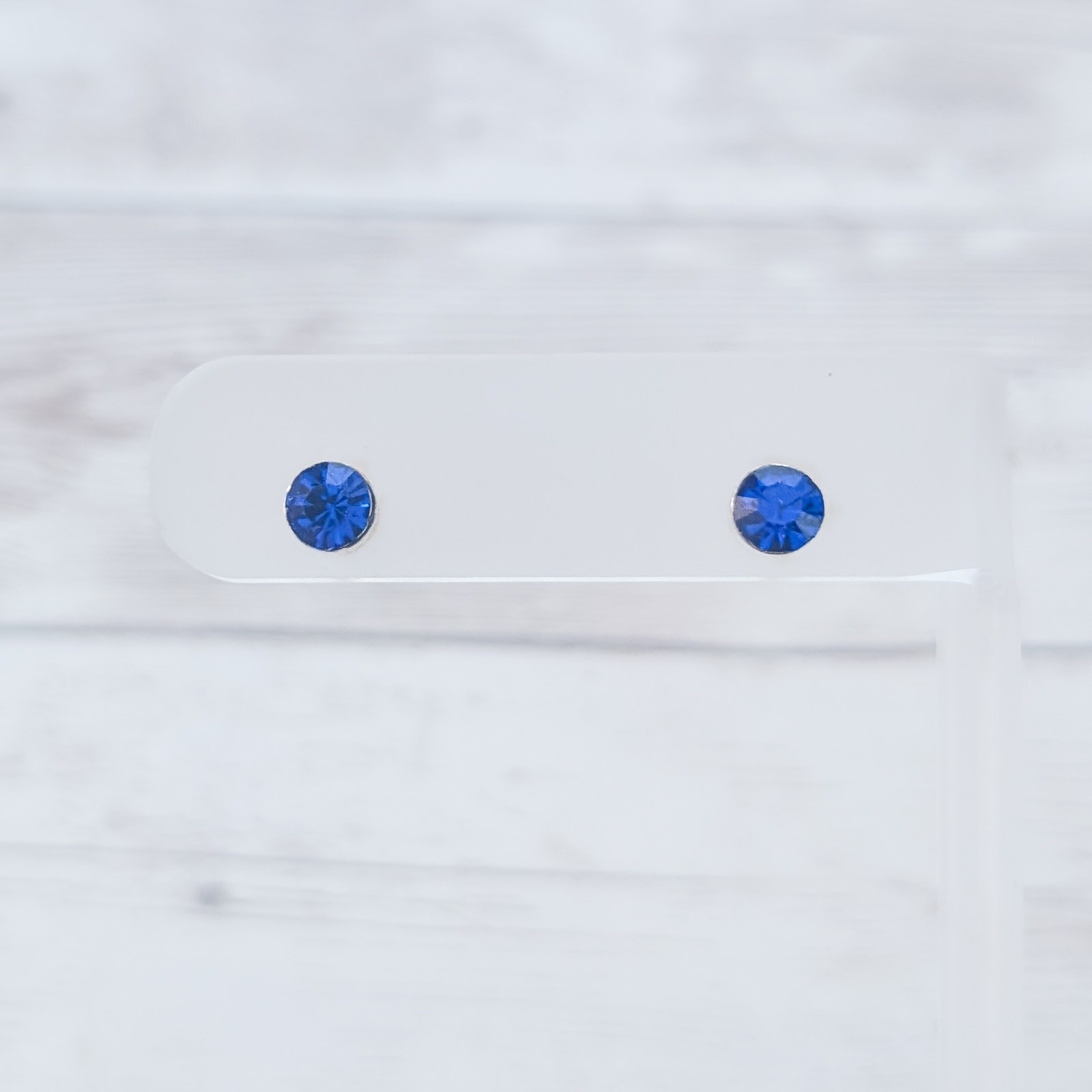 Blue Gem & Silver Tone Stud Earrings – 0.25″