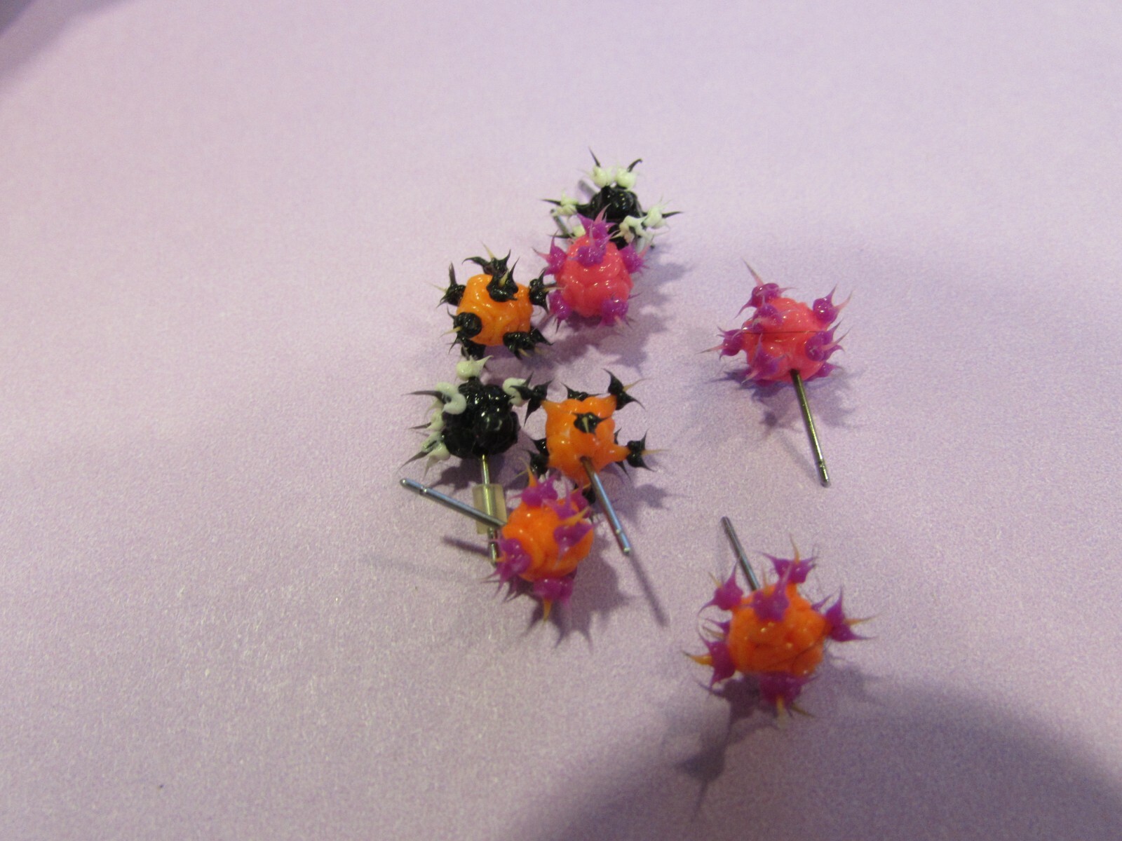 4 pair rubber pierced post earrings pink, purple, orange, black, white – 1 back