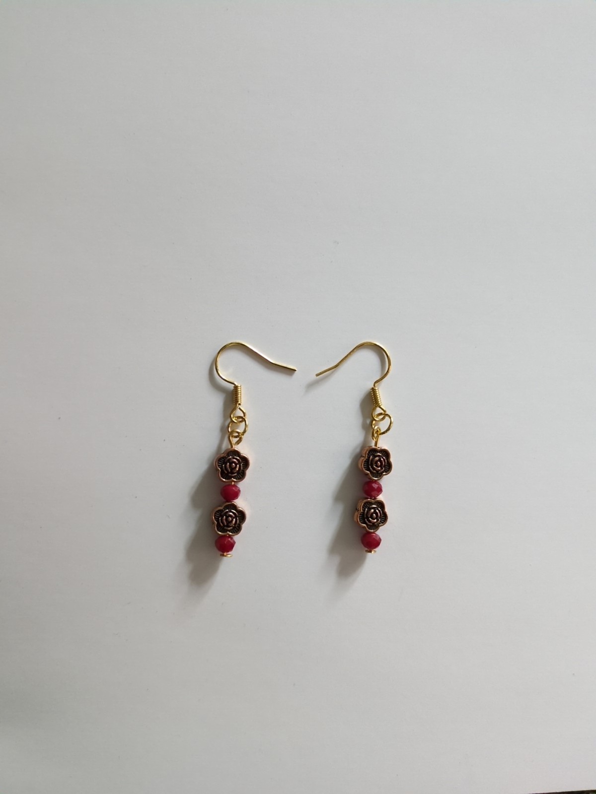 Handcrafted Plated Red Glass and Metal earrings.