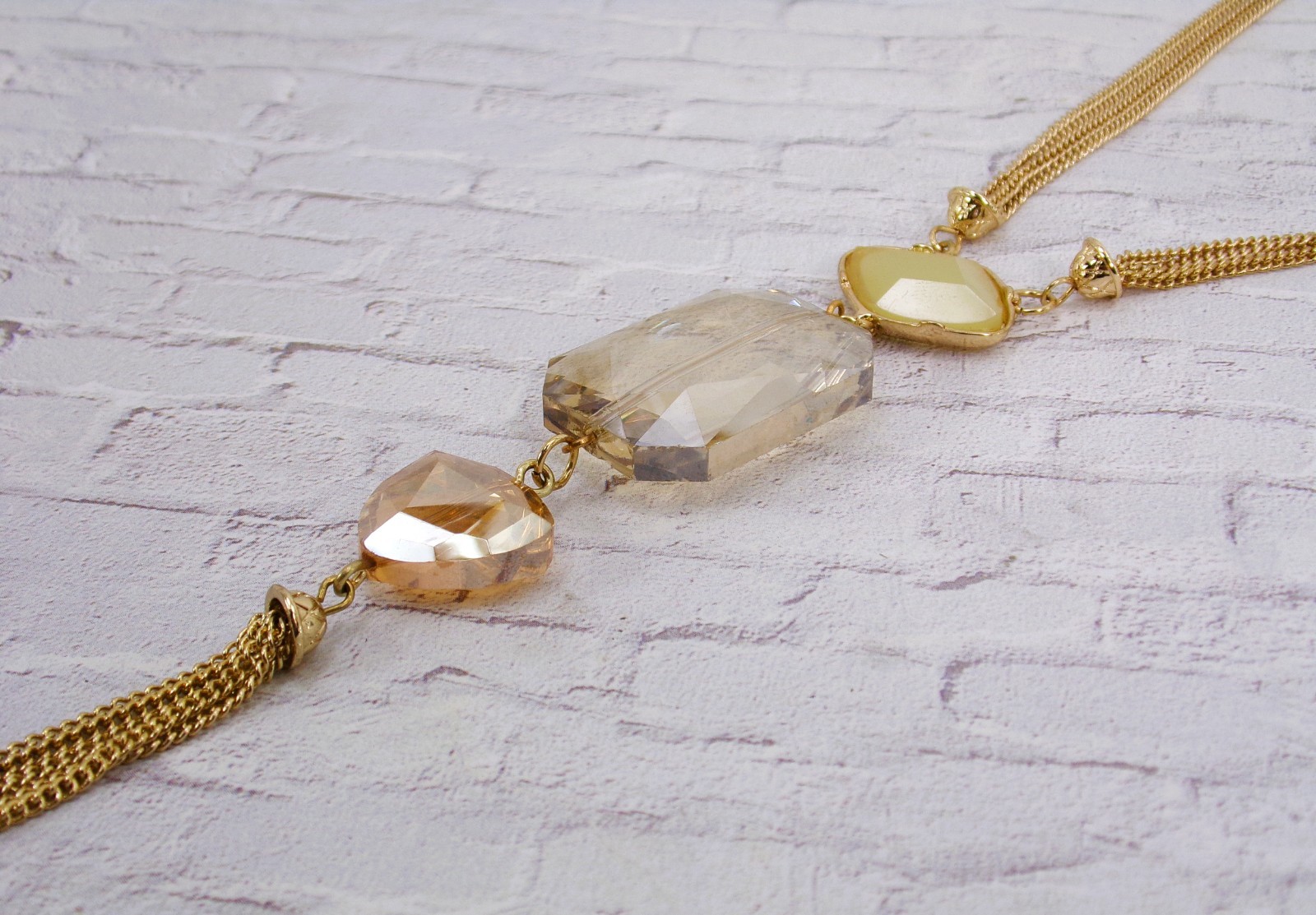 Gold tassel chain pendant necklace with glass beads in beige and light orange