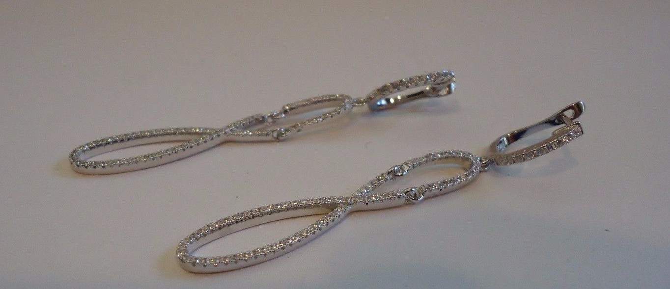 925 STERLING SILVER LADIES DANGLING FIGURE 8 EARRINGS W/ LAB CREATED DIAMONDS