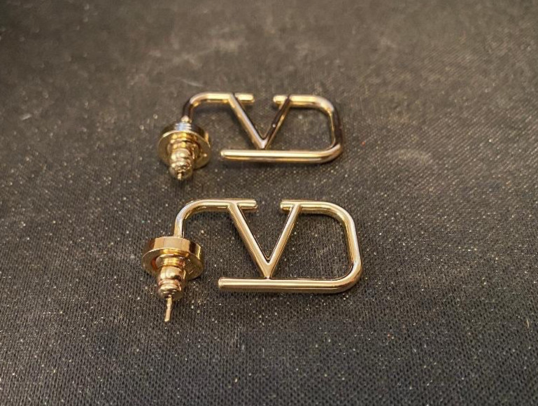 Stunning Pre loved Womens Valentino Gold Tone V Logo Earrings.