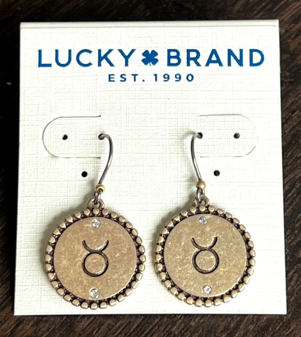 Lucky Brand brass plated crystal Taurus earrings.