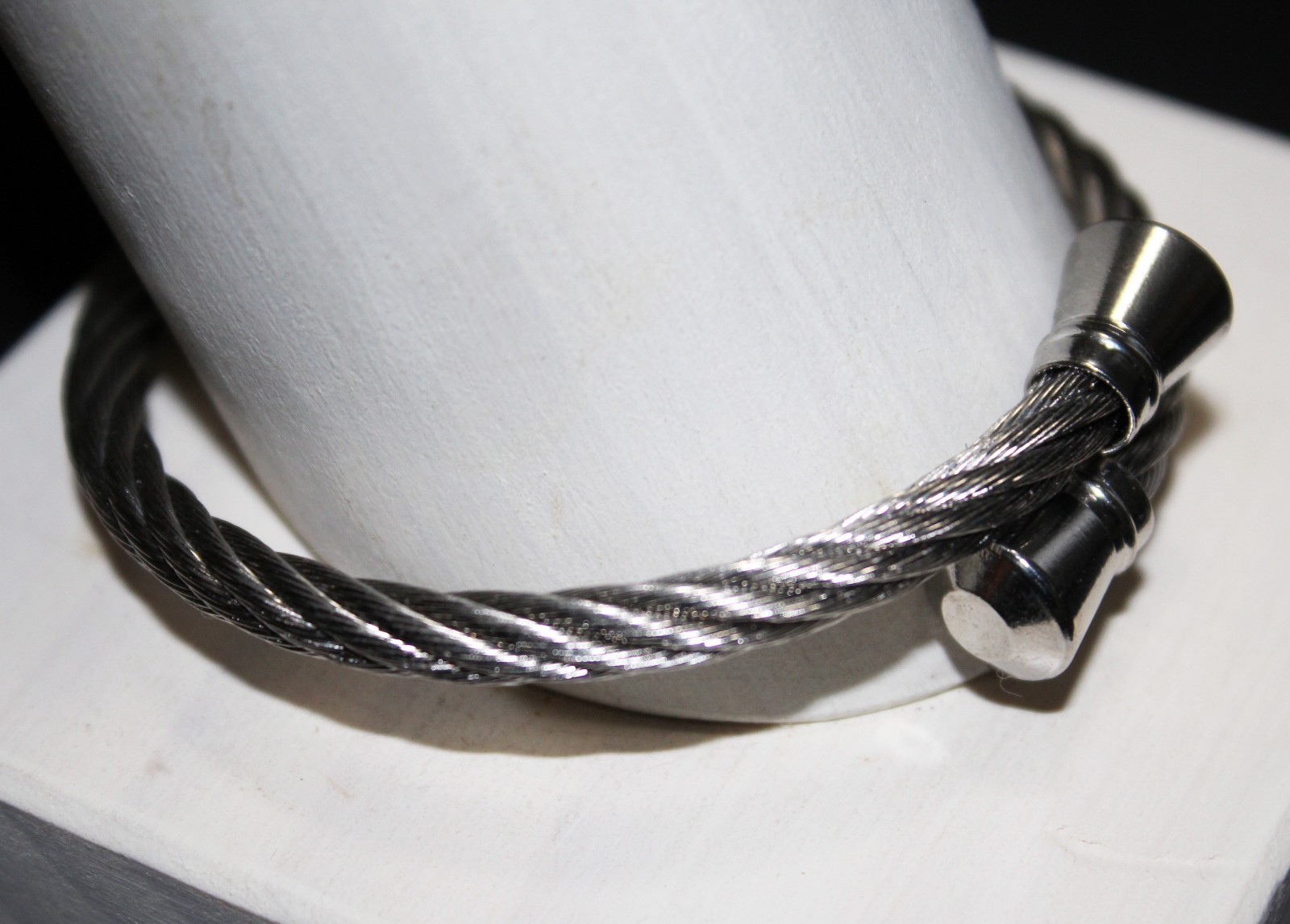 Black or Silver over Stainless Twisted Bracelet-Silver Encaps – Fits All Wrists