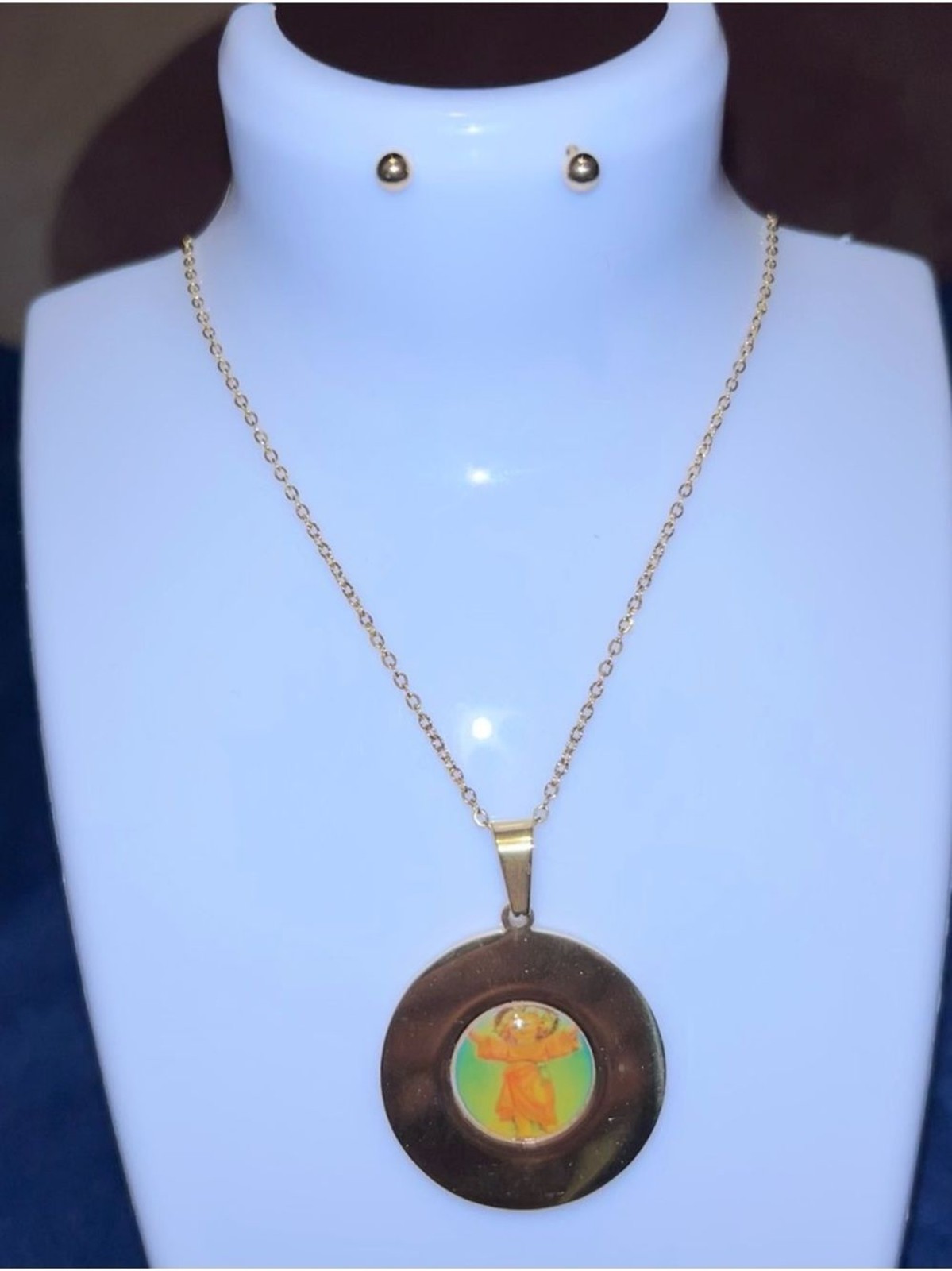Gold Tone Round Pendant Necklace with Orange Accent