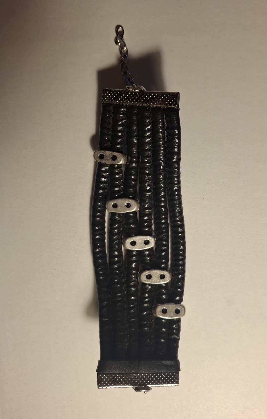Pre-owned no brand black faux leather or vinyl bracelet w/ silvertone hardware