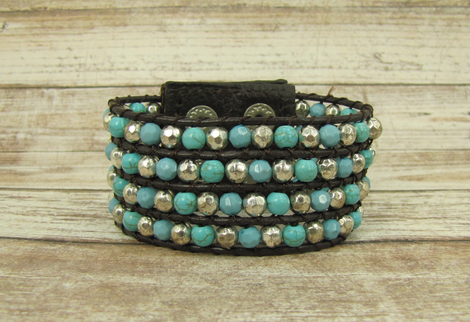 Wide turquoise and silver beaded leather bracelet , snap closure, brown leather