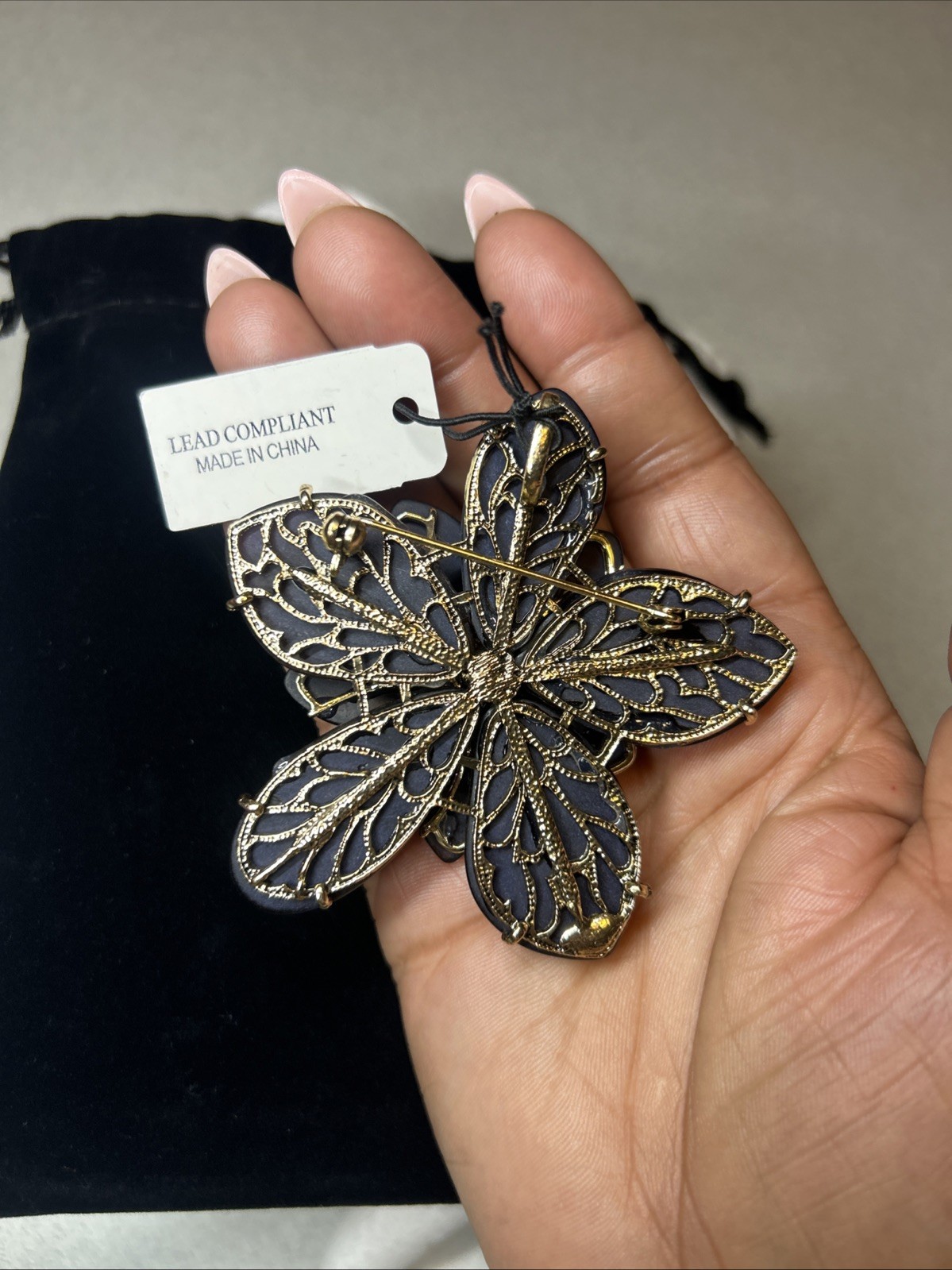 NATASHA RESIN FLOWER BROOCH WITH MULTICOLOURED RHINESTONES IN YELLOW/ BLACK